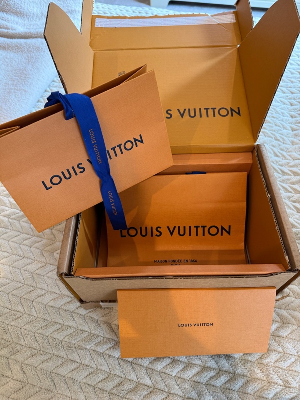 Louis Vuitton Orange Boxes with Blue Ribbon